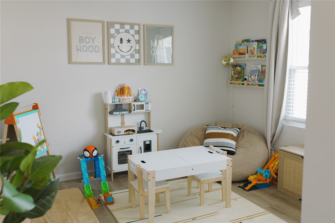 314 Callie Way Easley, SC 29642 - Photo 4 of 27 This bright playroom offers a versatile space for creativity and relaxation.