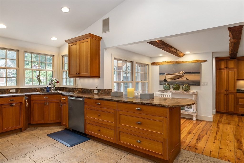 356 Main Street Amesbury, MA 01913 - Photo 12 of 41 a large kitchen with kitchen island granite countertop lots of counter top space