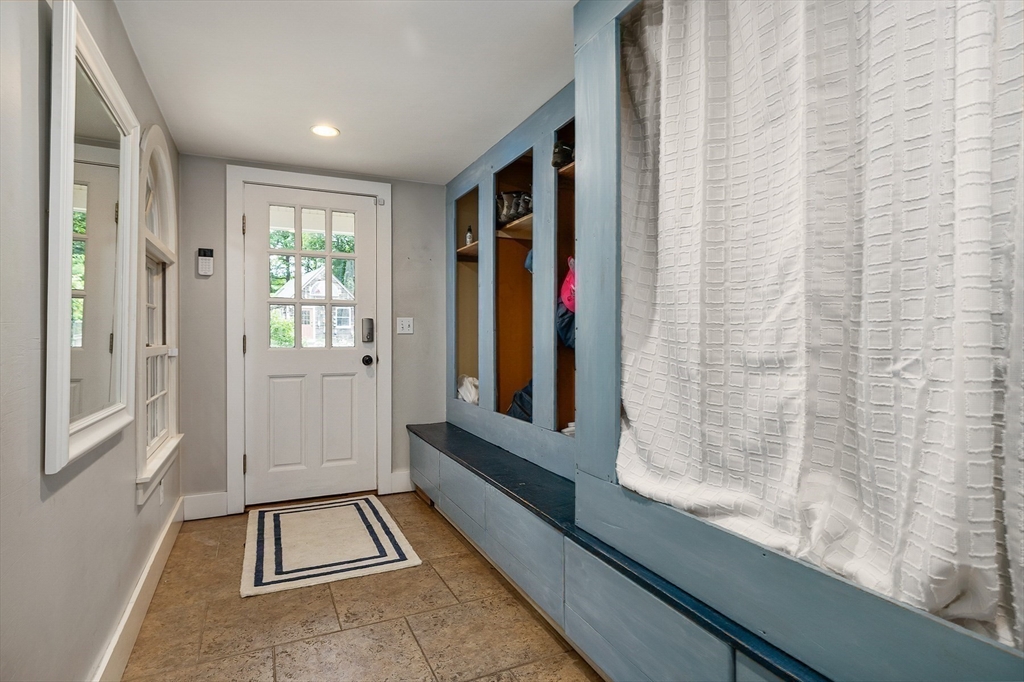 356 Main Street Amesbury, MA 01913 - Photo 16 of 41 a view of front door with a couch and a window