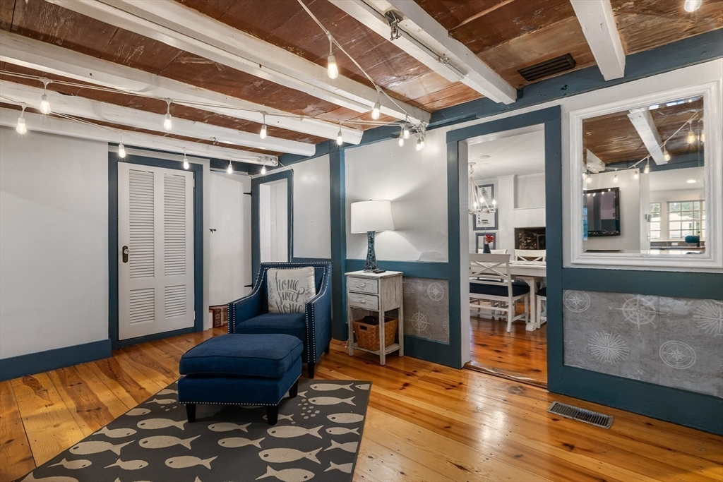 356 Main Street Amesbury, MA 01913 - Photo 19 of 41 a living room with furniture and wooden floor