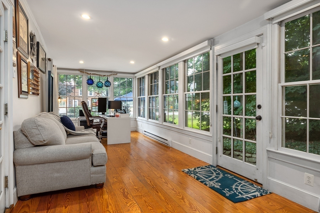 356 Main Street Amesbury, MA 01913 - Photo 23 of 41 a living room with furniture and a large window
