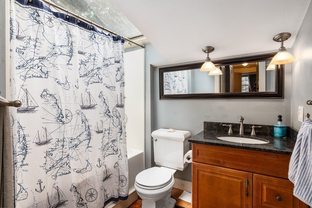 356 Main Street Amesbury, MA 01913 - Photo 33 of 41 a bathroom with a toilet and a sink