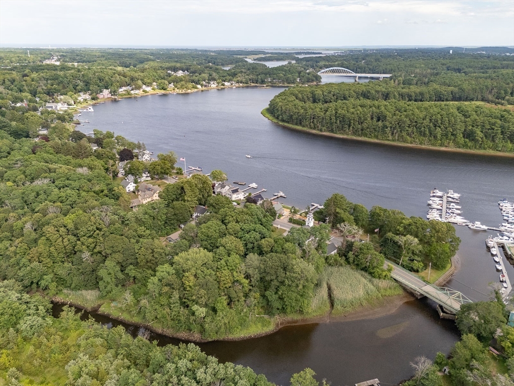 356 Main Street Amesbury, MA 01913 - Photo 39 of 41 an aerial view of a houses with a lake view