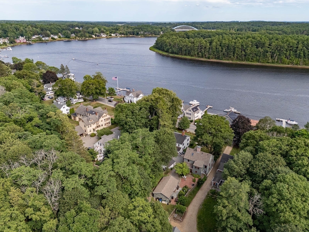 356 Main Street Amesbury, MA 01913 - Photo 40 of 41 an aerial view of a house with outdoor space and lake view