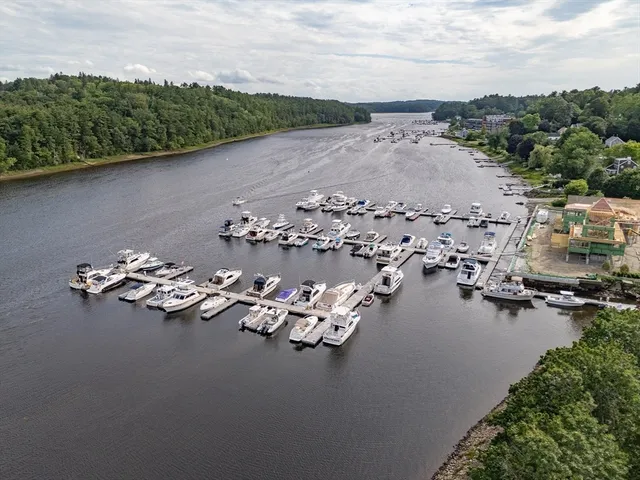an aerial view of a house with outdoor space
