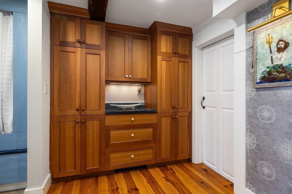 356 Main Street Amesbury, MA 01913 - Photo 8 of 41 a view of a kitchen with wooden floor