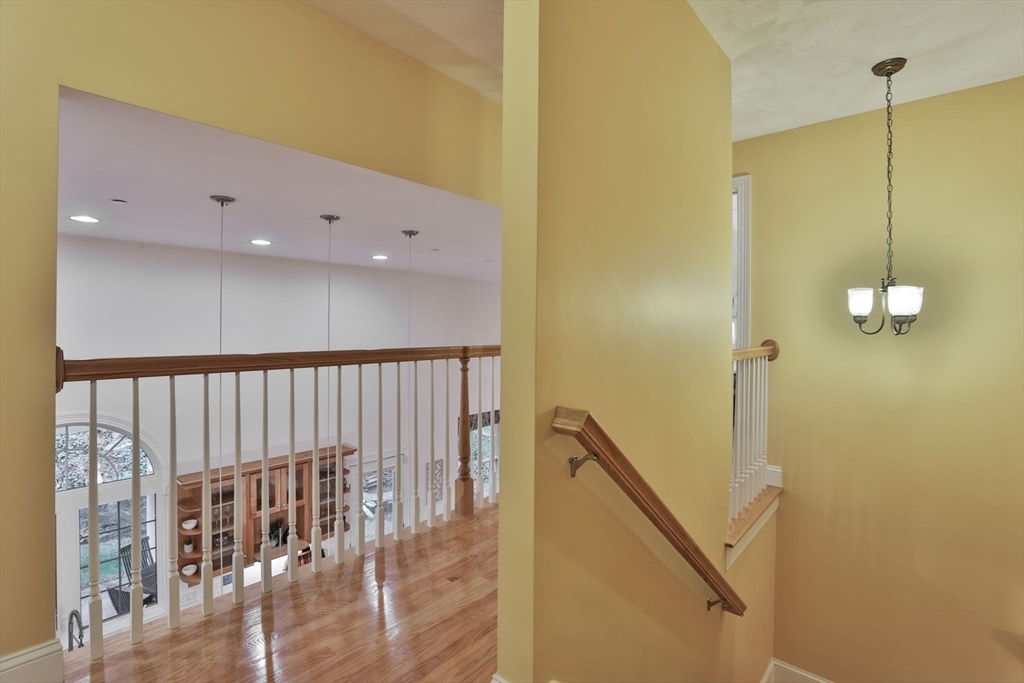 53 Cooper Street Wakefield, MA 01880 - Photo 23 of 42 a view of a hallway with windows