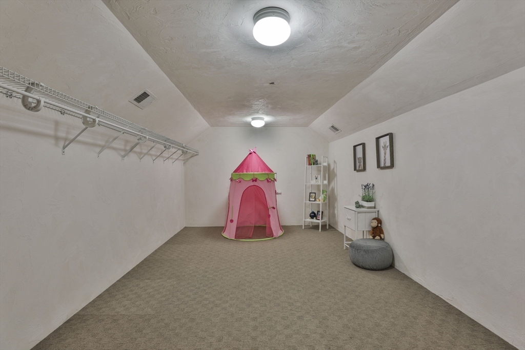 53 Cooper Street Wakefield, MA 01880 - Photo 26 of 42 a view of a room with gym equipment