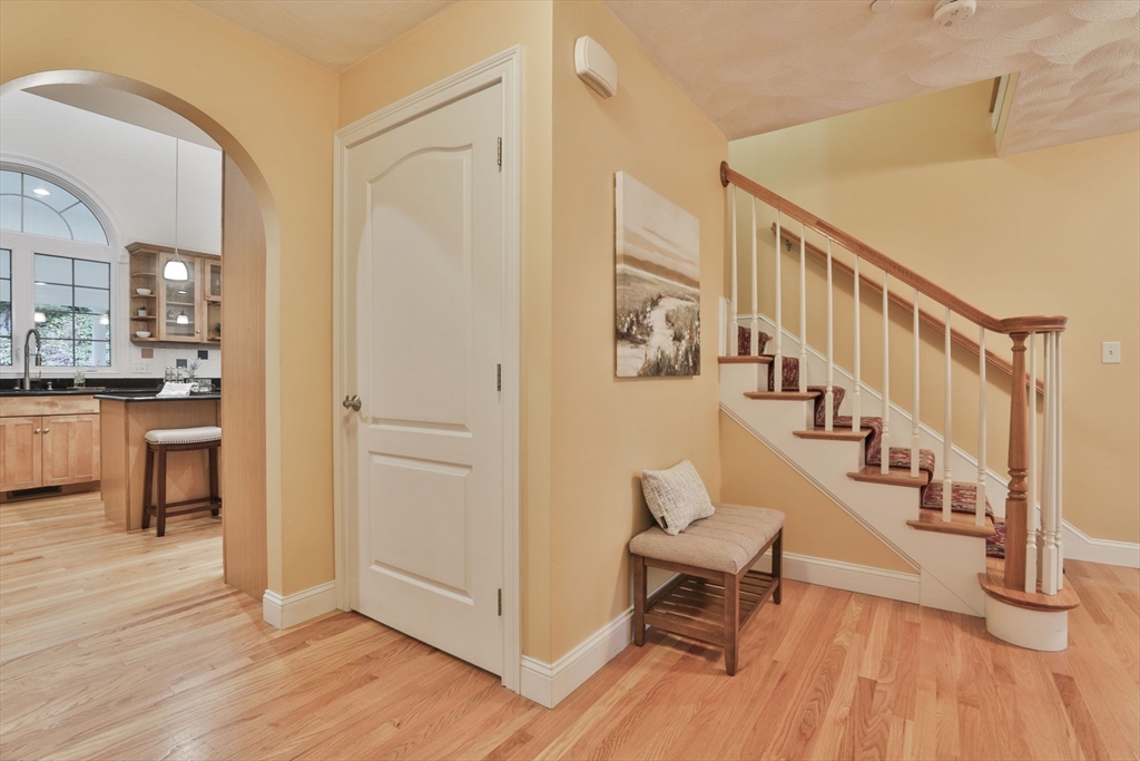 53 Cooper Street Wakefield, MA 01880 - Photo 3 of 42 a outdoor space with lots of furniture and wooden floor