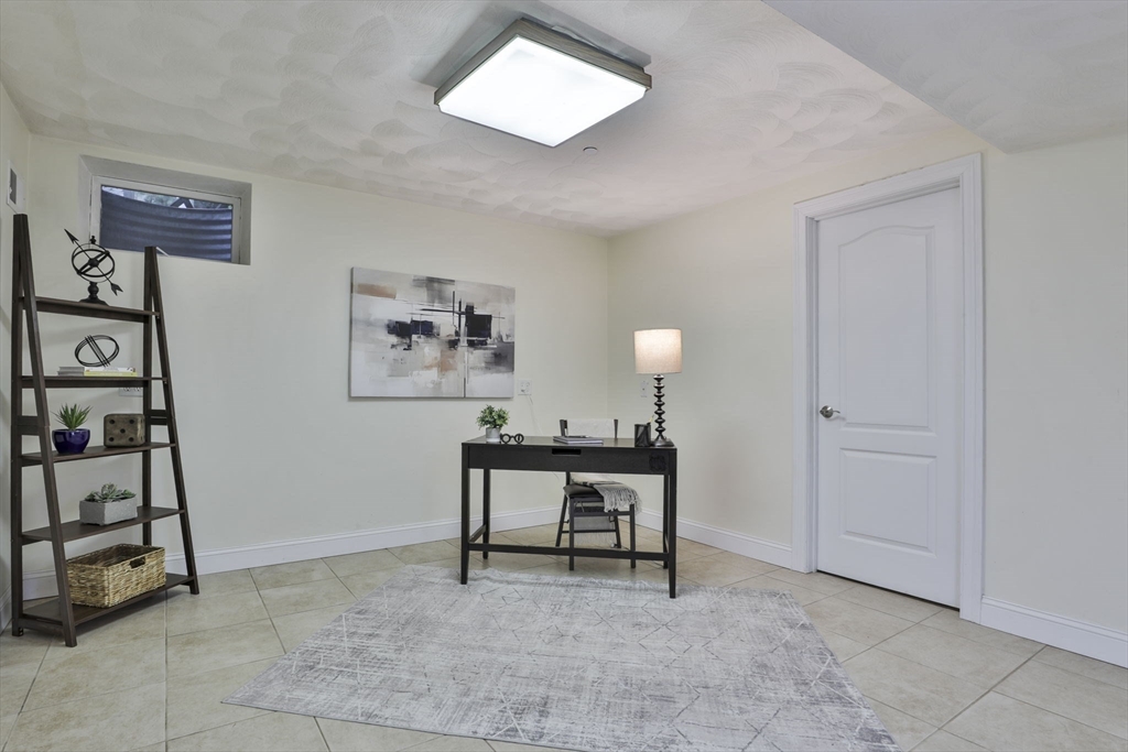 53 Cooper Street Wakefield, MA 01880 - Photo 33 of 42 a view of work space with lounge chair