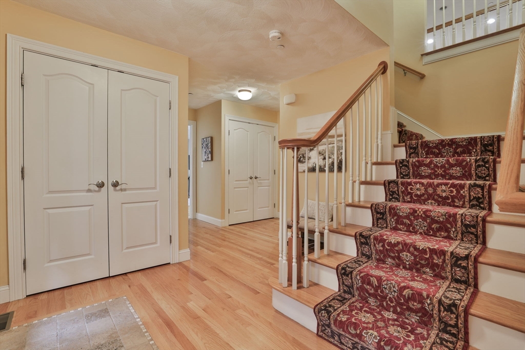 53 Cooper Street Wakefield, MA 01880 - Photo 4 of 42 a view of entryway with wooden floor