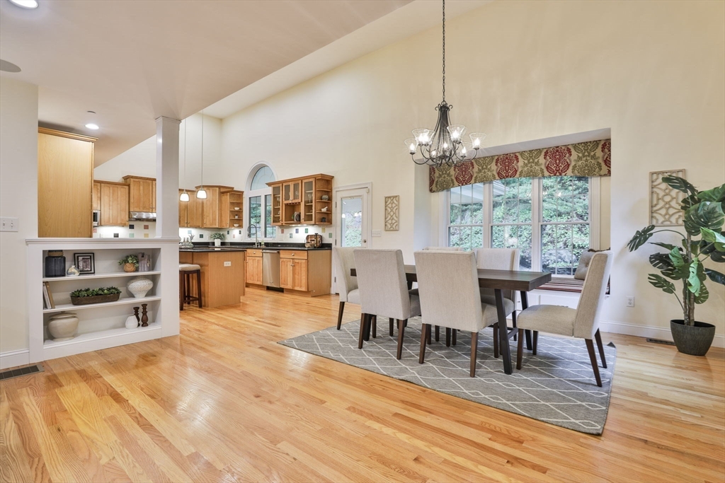 53 Cooper Street Wakefield, MA 01880 - Photo 10 of 42 a view of a dining room with furniture window and wooden floor