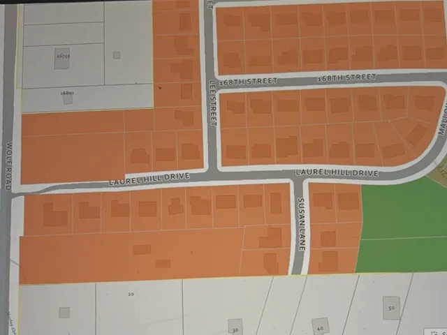 a blue sign broad in front of a door