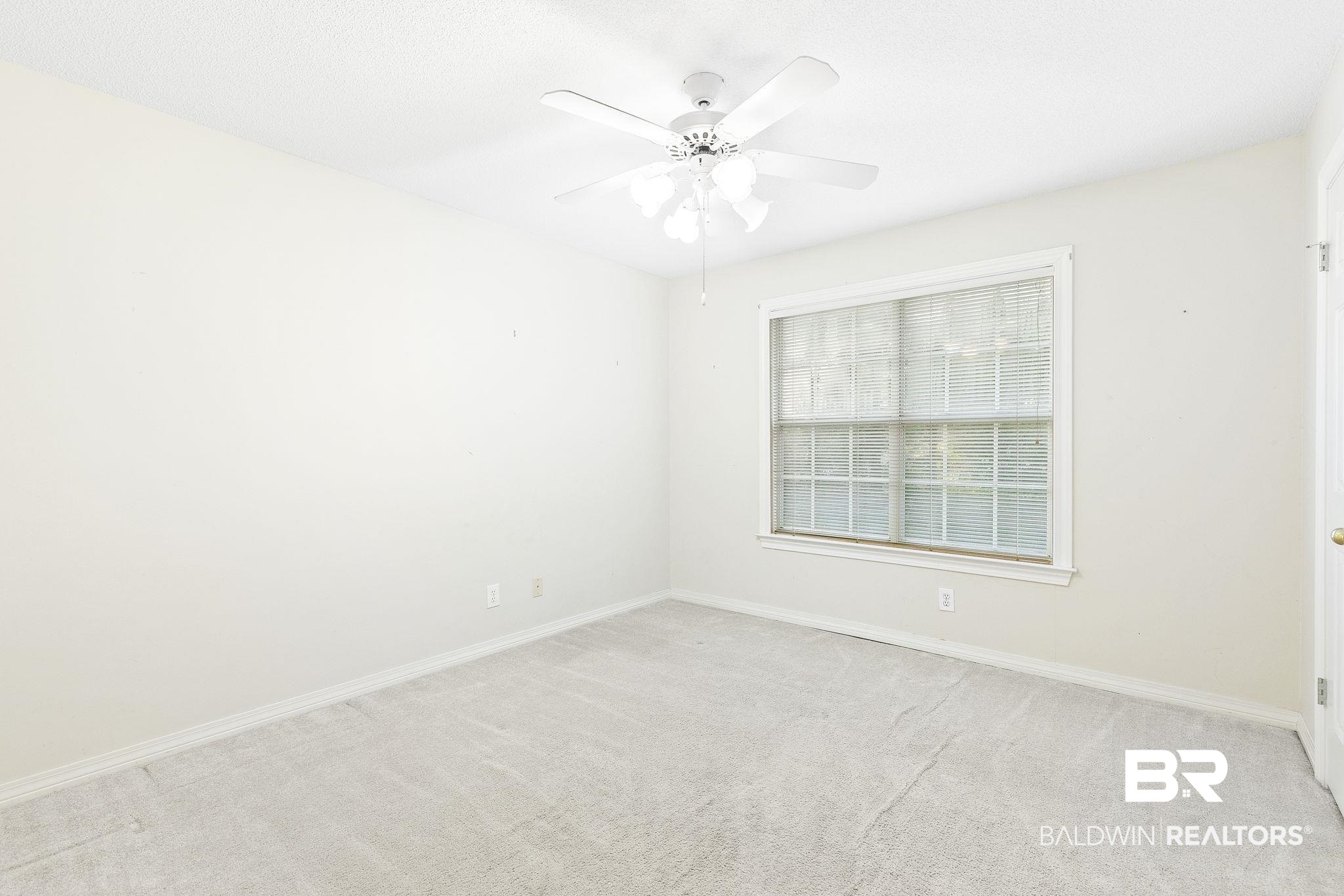 2100 Stonebrook Drive West Mobile, AL 36695 - Photo 34 of 60 Carpeted spare room with ceiling fan