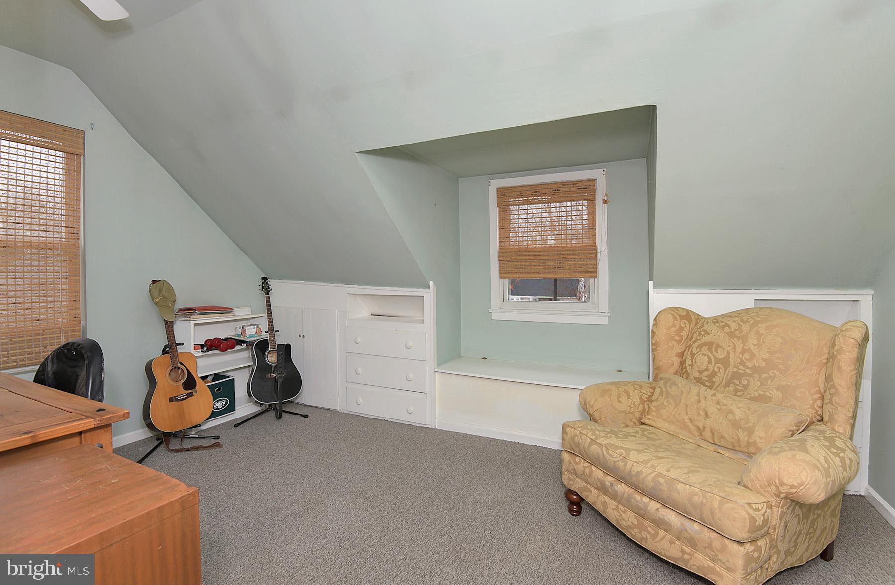 56 Ridgewood Avenue Ewing, NJ 08618 - Photo 24 of 28 a living room with furniture and a window