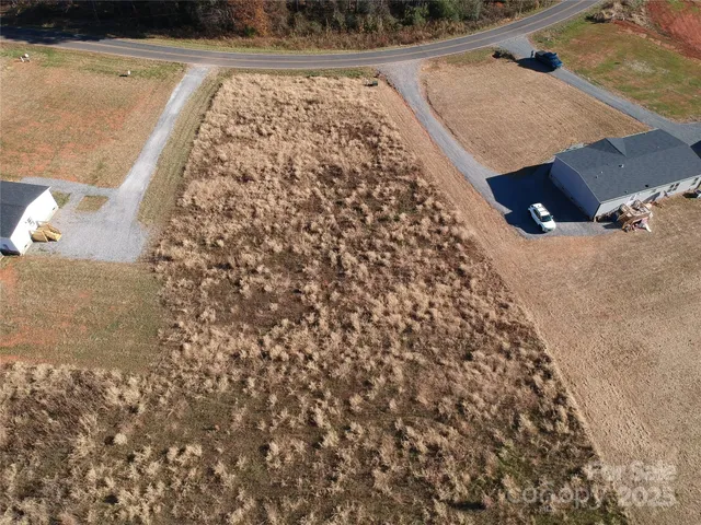 a living room with a couch and a night stand