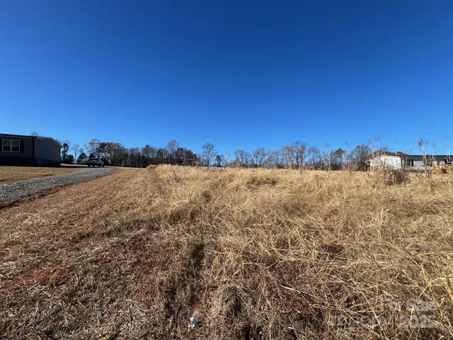 a view of a yard covered in snow