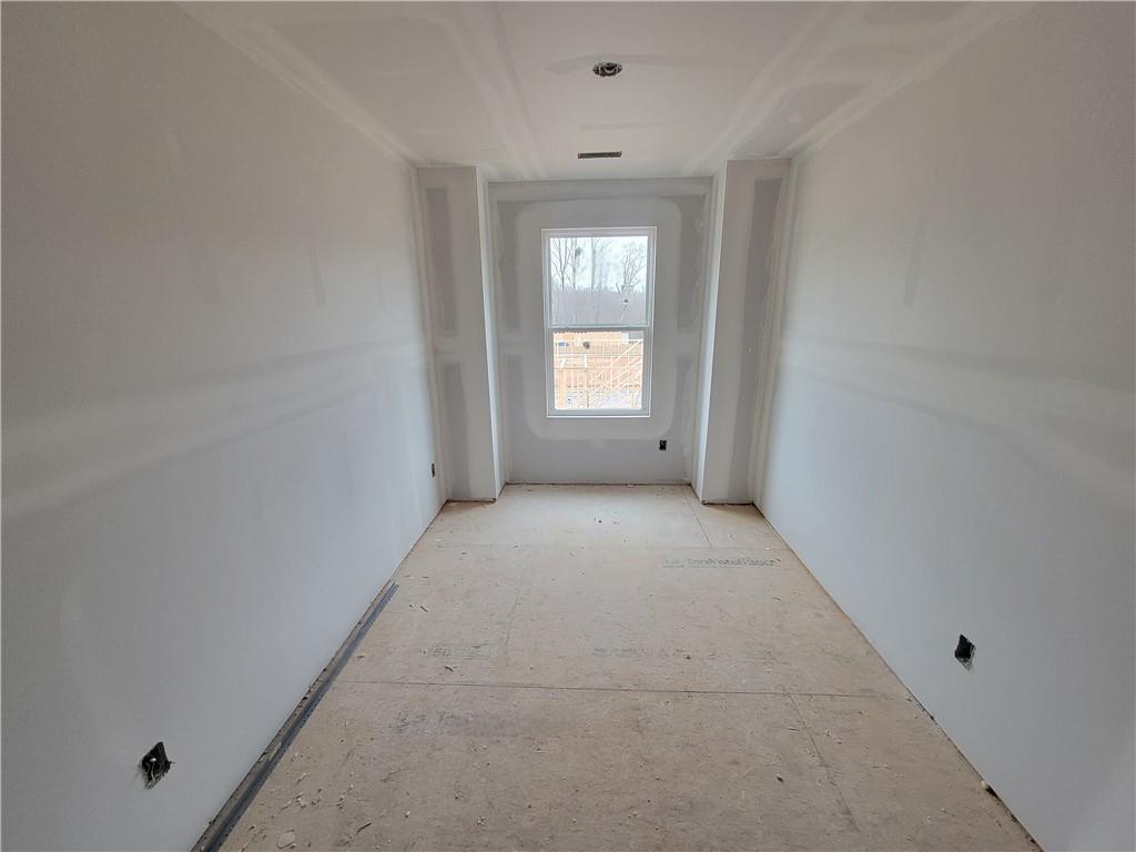 73 Silverleaf Trail Bethlehem, GA 30620 - Photo 11 of 25 a view of an empty room with window