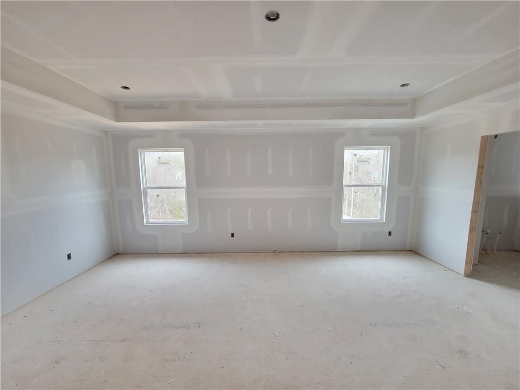 73 Silverleaf Trail Bethlehem, GA 30620 - Photo 9 of 25 a view of an empty room with a window