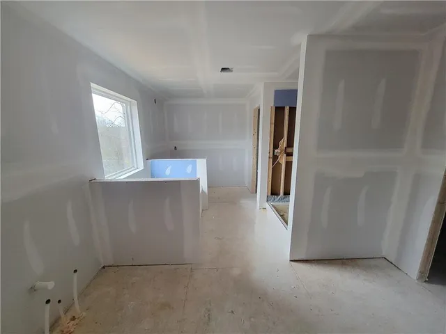 a view of a kitchen with an empty space