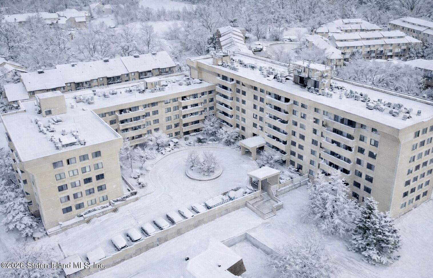 11 Windham Loop, Unit 5LL Staten Island, NY 10314 - Photo 2 of 19 a view of a large building with backyard