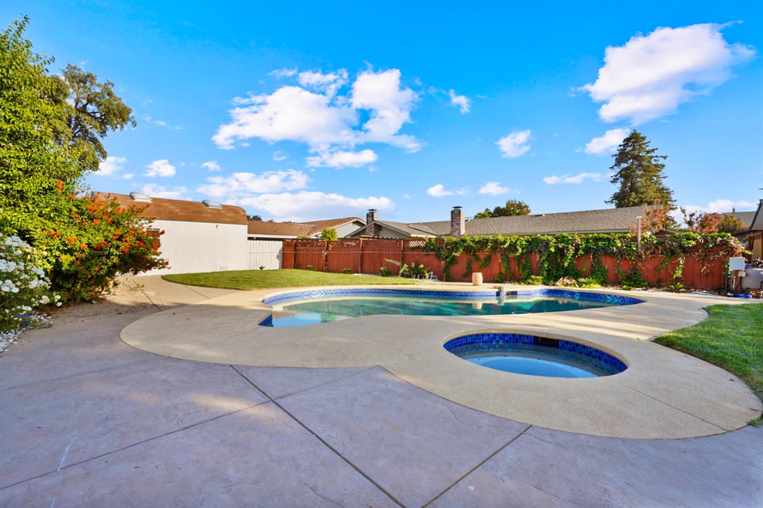 728 R Street Newman, CA 95360 - Photo 14 of 19 a view of swimming pool with outdoor seating and yard