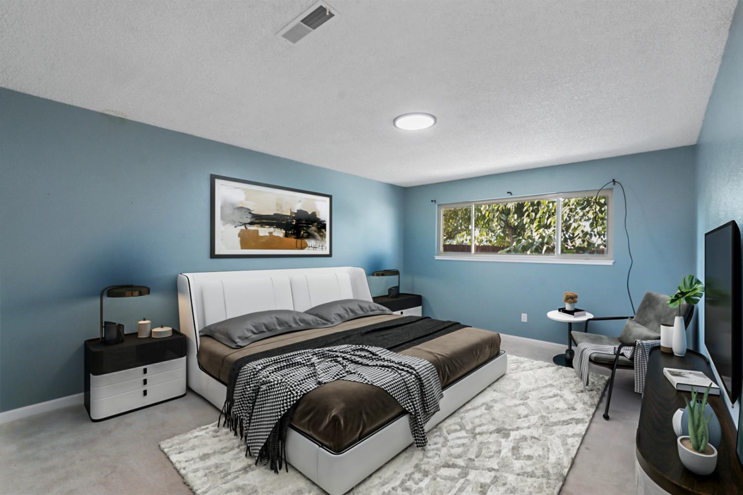 728 R Street Newman, CA 95360 - Photo 9 of 19 a bedroom with a bed and a desk