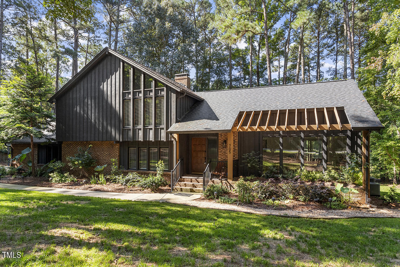 705 Lanham Place Raleigh, NC 27615 - Photo 1 of 53 a view of swimming pool with outdoor seating and plants
