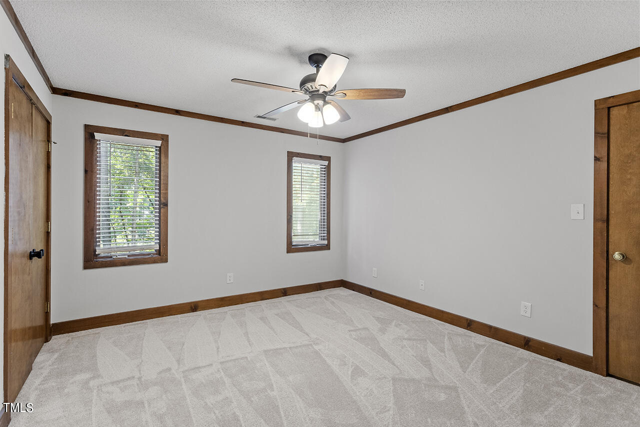 705 Lanham Place Raleigh, NC 27615 - Photo 29 of 53 a view of an empty room with a window