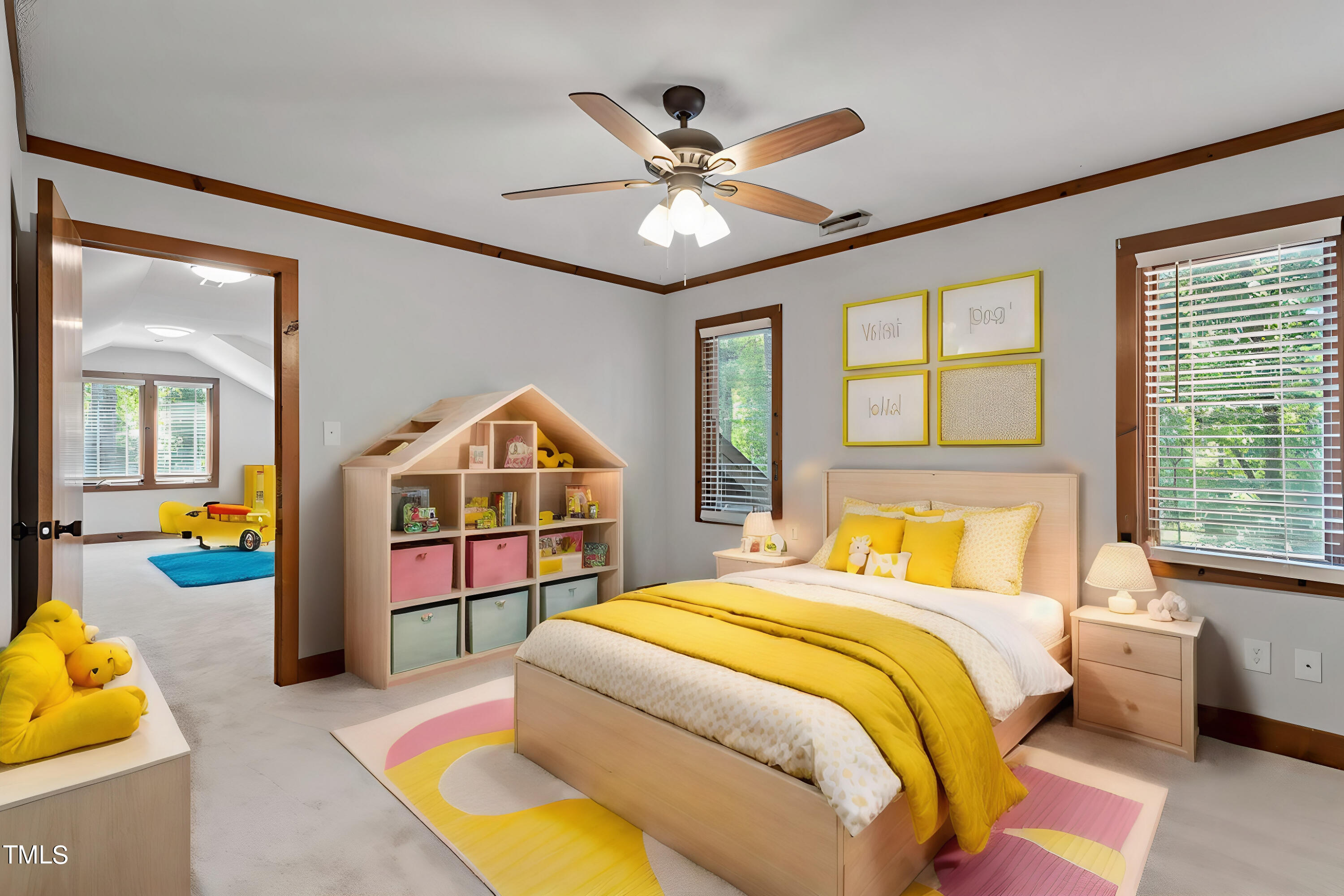 705 Lanham Place Raleigh, NC 27615 - Photo 35 of 53 a spacious bedroom with a bed and a chandelier
