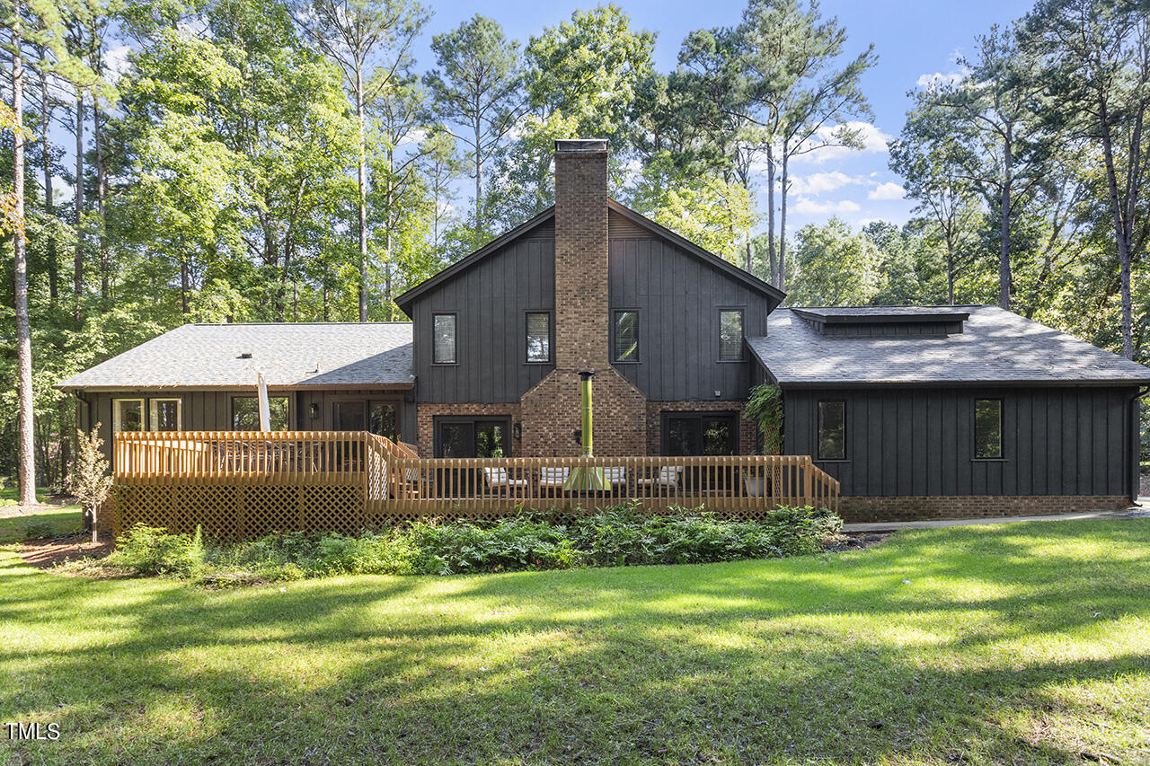 705 Lanham Place Raleigh, NC 27615 - Photo 46 of 53 a front view of a house with garden