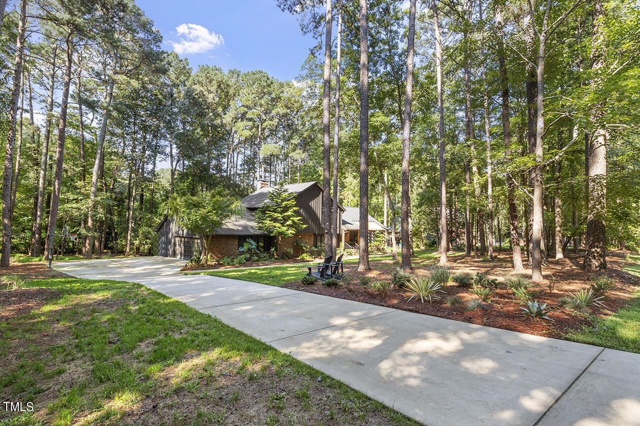 705 Lanham Place Raleigh, NC 27615 - Photo 50 of 53 a view of a park with large trees