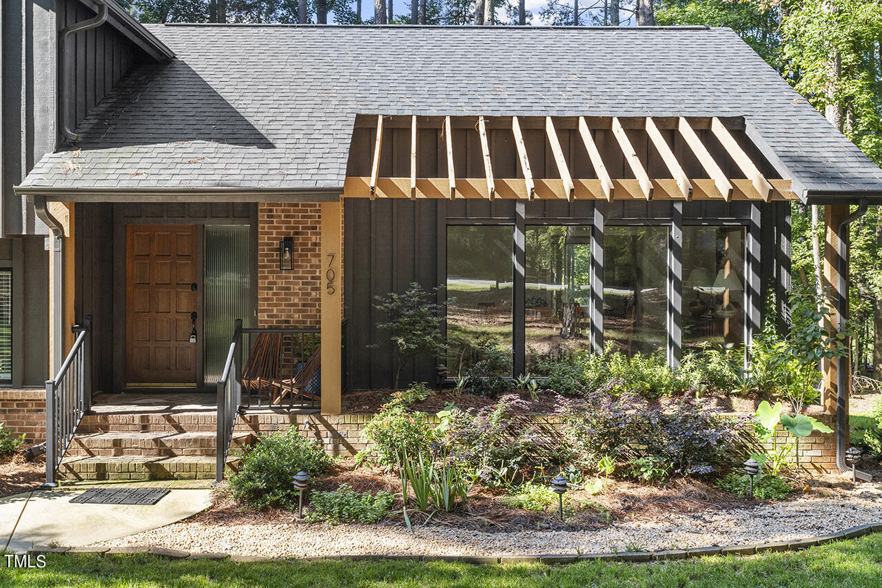 705 Lanham Place Raleigh, NC 27615 - Photo 52 of 53 front view of a house with a yard