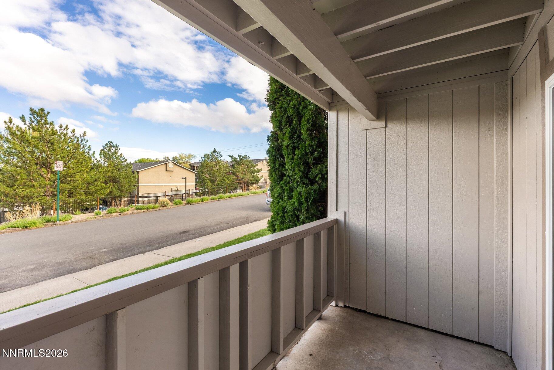 3935 Clear Acre Lane, Unit 211 Reno, NV 89512 - Photo 14 of 25 a view of a street from a balcony