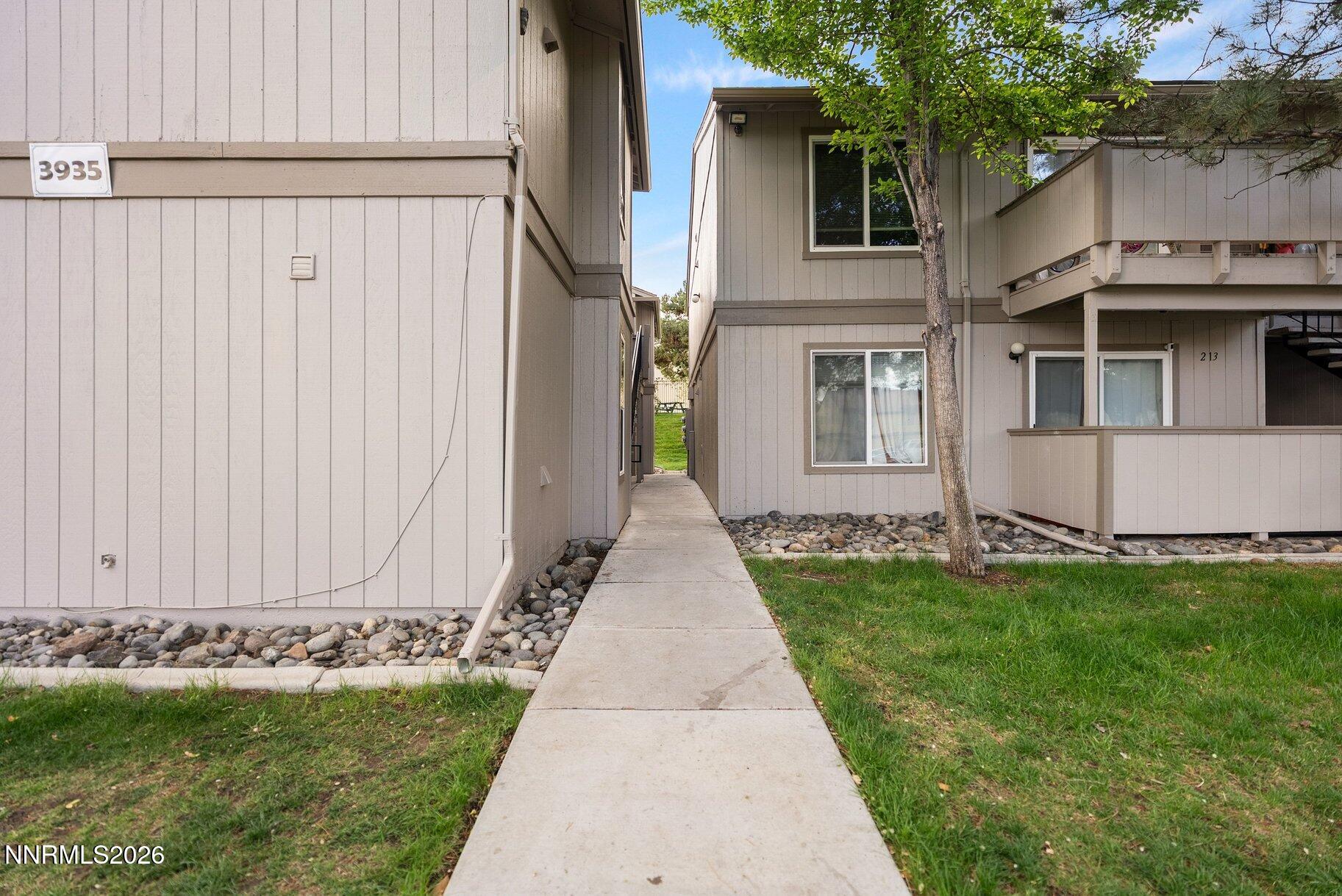 3935 Clear Acre Lane, Unit 211 Reno, NV 89512 - Photo 17 of 25 a view of a back yard of the house