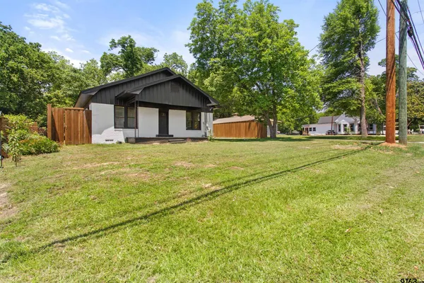 a house view with a outdoor space