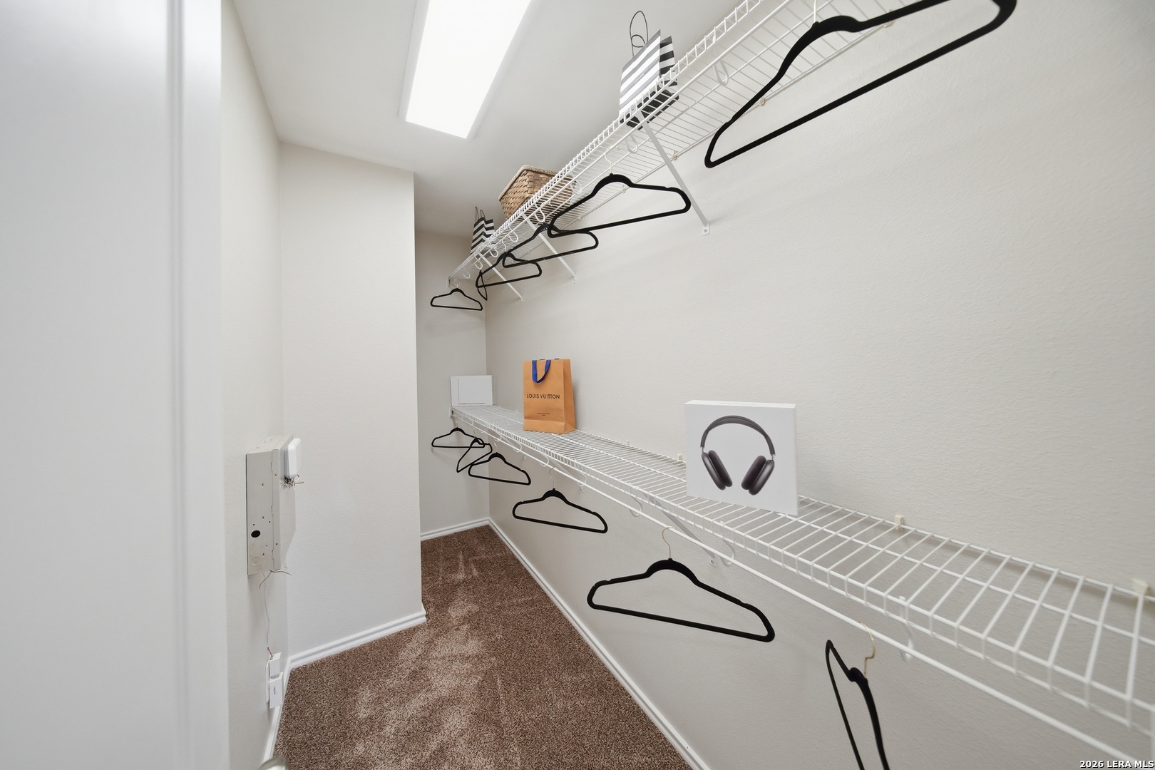 5607 Spring Quail San Antonio, TX 78247 - Photo 16 of 25 a bathroom with a sink and a mirror