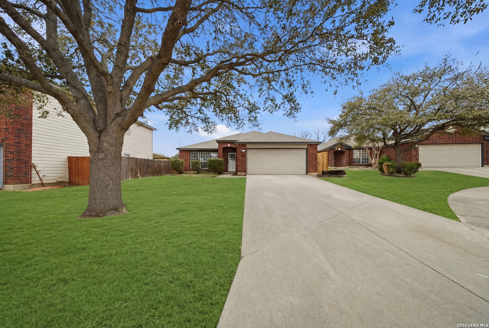 5607 Spring Quail San Antonio, TX 78247 - Photo 2 of 25 a front view of house with yard and green space