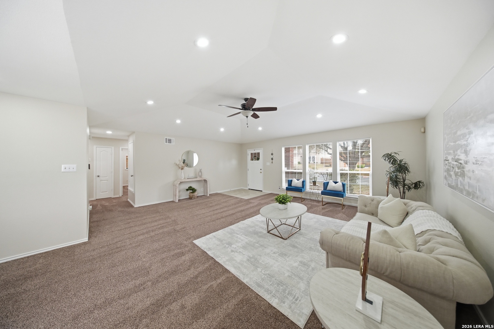 5607 Spring Quail San Antonio, TX 78247 - Photo 4 of 25 a living room with furniture and a large window
