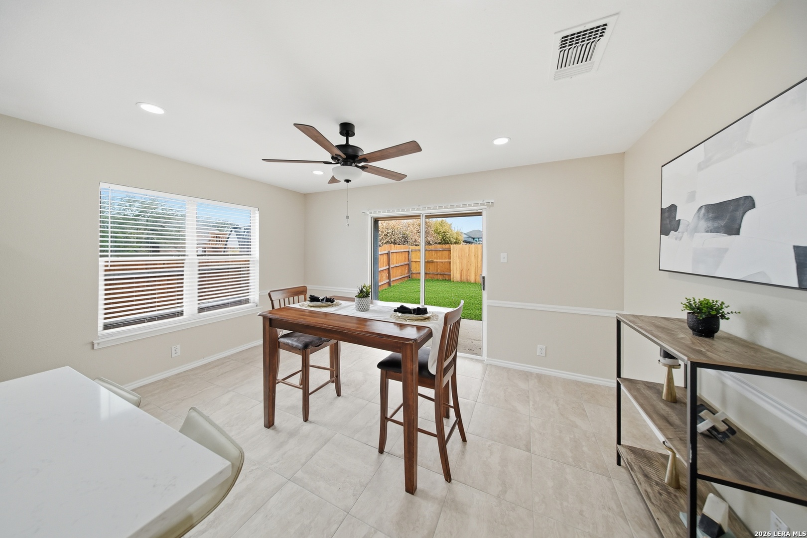 5607 Spring Quail San Antonio, TX 78247 - Photo 9 of 25 a view of a workspace with furniture and a window