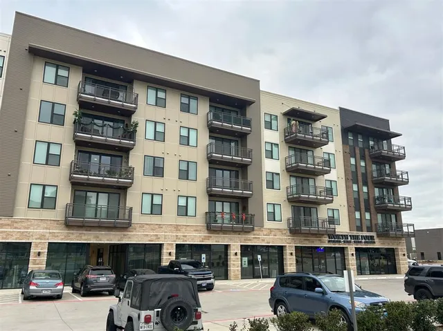 a car parked in front of a building