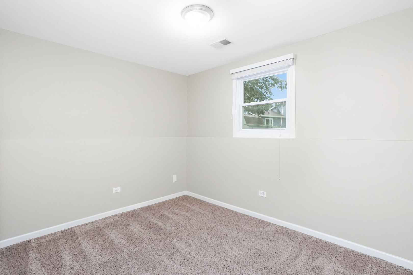 2165 Savannah Road Elgin, IL 60123 - Photo 19 of 27 an empty room with a window