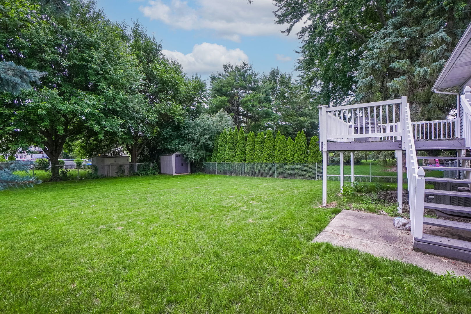 2165 Savannah Road Elgin, IL 60123 - Photo 24 of 27 a view of a table and chairs in the garden