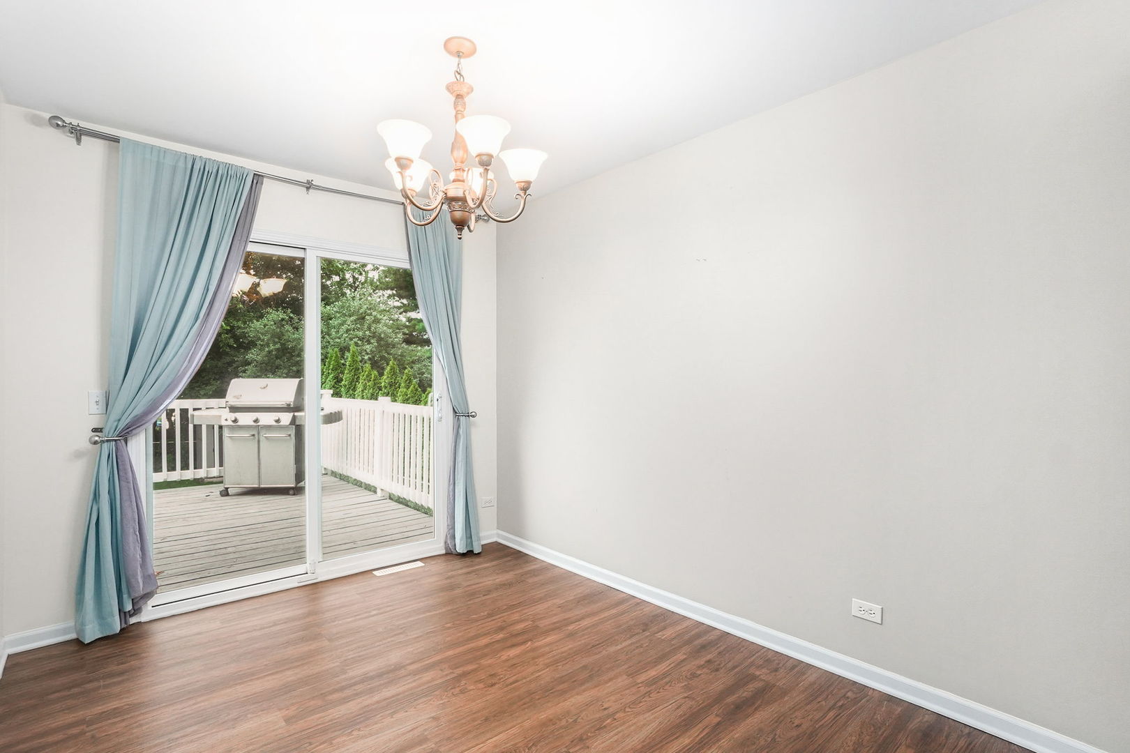2165 Savannah Road Elgin, IL 60123 - Photo 8 of 27 wooden floor in an empty room with a window