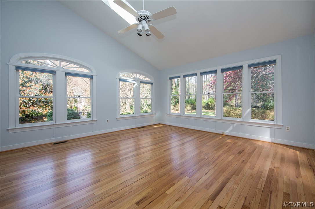 14430 West Salisbury Road Midlothian, VA 23113 - Photo 14 of 36 a view of an empty room with wooden floor and a window