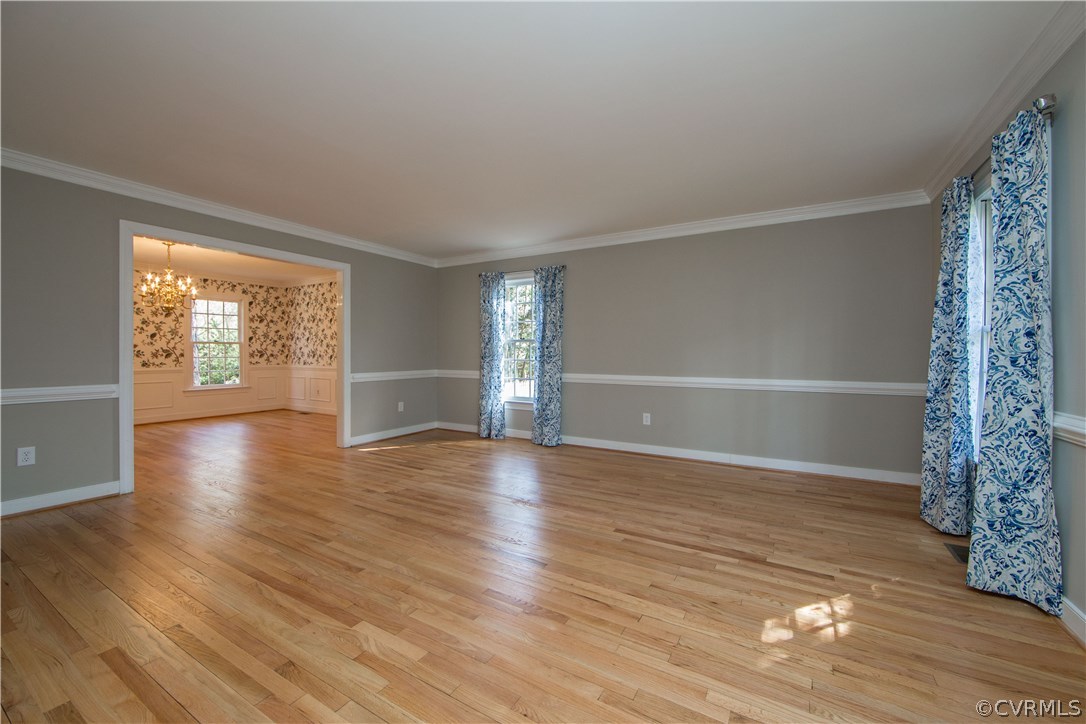14430 West Salisbury Road Midlothian, VA 23113 - Photo 17 of 36 wooden floor in an empty room with a window