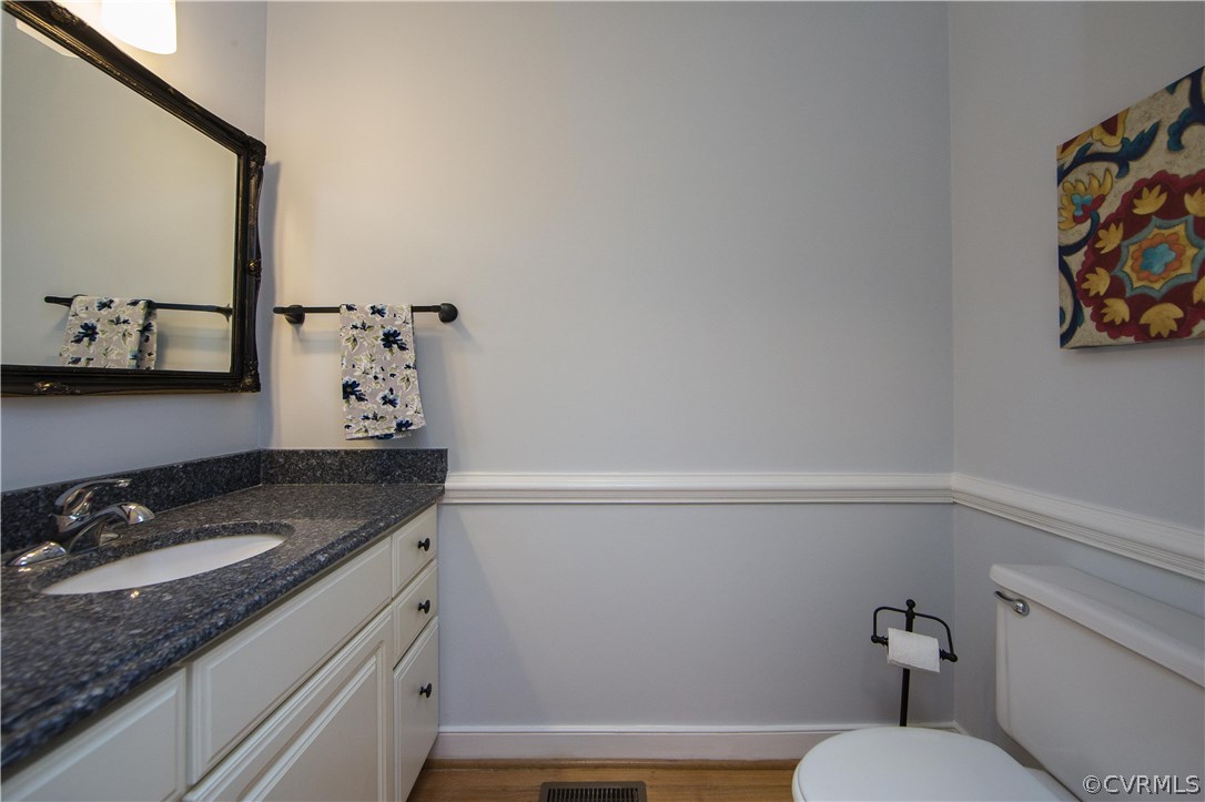 14430 West Salisbury Road Midlothian, VA 23113 - Photo 18 of 36 a bathroom with a granite countertop sink and a mirror