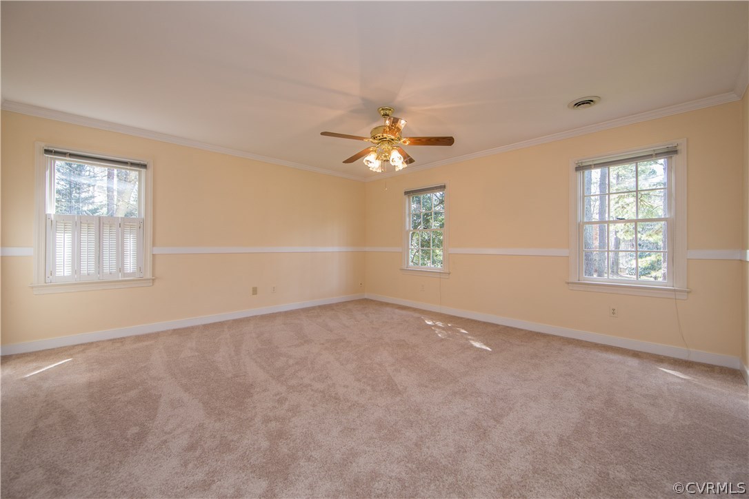 14430 West Salisbury Road Midlothian, VA 23113 - Photo 19 of 36 an empty room with windows and fan