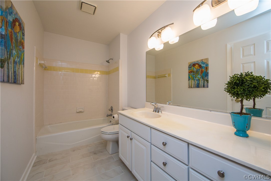 14430 West Salisbury Road Midlothian, VA 23113 - Photo 25 of 36 a spacious bathroom with a granite countertop sink a toilet a shower and a mirror
