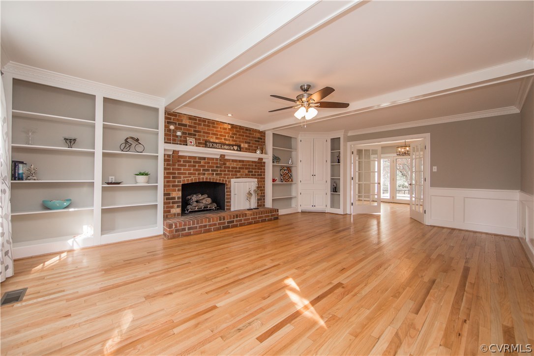 14430 West Salisbury Road Midlothian, VA 23113 - Photo 4 of 36 a view of an empty room with wooden floor fireplace and a window